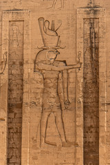 ancient egyptian architecture ruins. hieroglyphs and columns of the Temple of Horus at Edfu, in...
