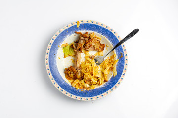 Turkey with noodles with corn salad, carrot and lettuce on white background