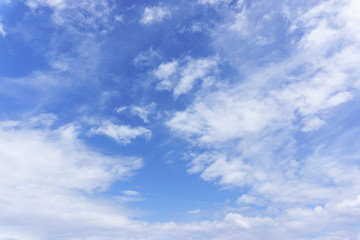 Naklejka na ściany i meble Cotton white cloud and space of the bright blue sky.