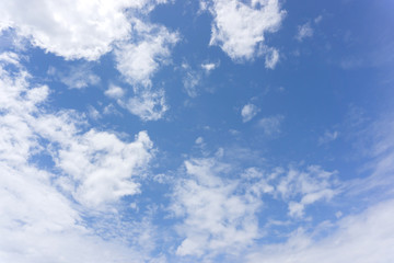 Cotton white cloud and space of the bright blue sky.