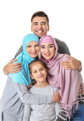 Fototapeta na wymiar Portrait of Muslim family on white background