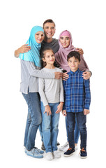 Fototapeta na wymiar Portrait of Muslim family on white background