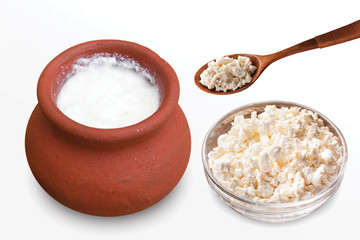 Desi Makhan, Fresh cottage cheese in a bowl with spoon & buttermilk on a white background. - image.