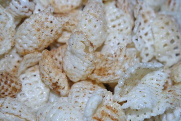 Closeup view of freshly fried chips as fast food usually eaten with tea.