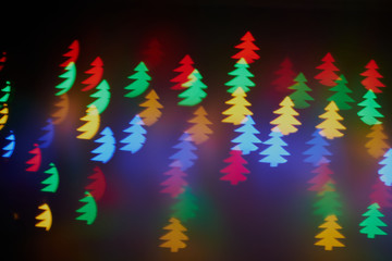 Obraz premium Blur background texture bokeh red, blue, yellow, green, round, hearts. Unfocused abstract Christmas background