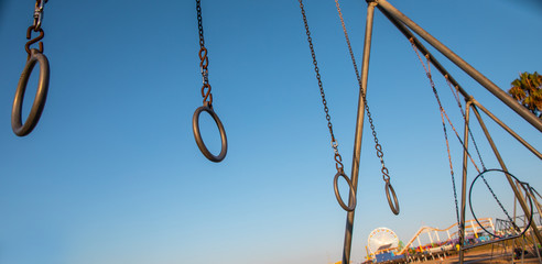 Travelling Rings for exercise at muscle beach jungle gym on in Santa Monica, California at early...