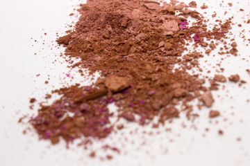 This is a photograph of Brown Powder Eyeshadow on a White background