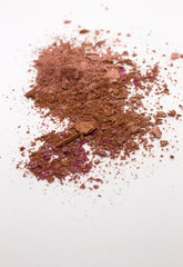 This is a photograph of Brown Powder Eyeshadow on a White background