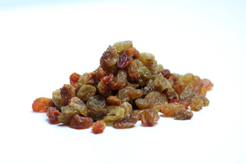 a pile of raisins isolated on white background. Horizontal image.