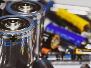 Salt and alkaline batteries, source of energy for portable technology. AAA and AA batteries