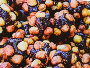 Slices of marmalade with hazelnuts. Hazelnut with sweets.