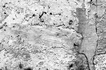 Texture of a concrete wall with cracks and scratches which can be used as a background