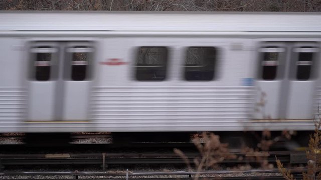 Cinematic Ground View of Metropolitan Train during an overcast winter day.

Camera Movement: Stationary
