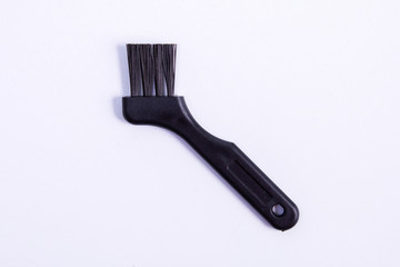 black brush on the handle on a white background