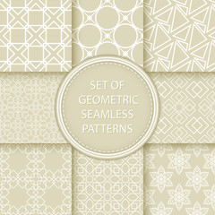 Compilation of seamless patterns. White abstract and geometric prints on olive green background