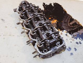 The head of the block of cylinders. The head of the block of cylinders removed from the engine for...
