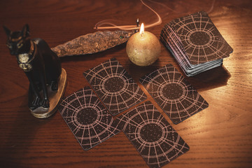 Mystical atmosphere, view of tarot card on the table, esoteric concept, fortune telling and predictions 