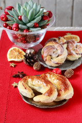 Traditional christmas cookies and decorations on the table.