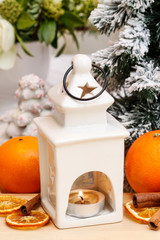 Beautiful ceramic lantern and fresh oranges