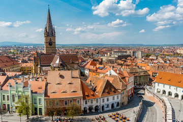 Obraz premium Piata Mica . The main sqaure in the old town of Sibiu during spring season . One of the most beautiful city which is Unesco sites of the country , Sibiu , Transylvania , Romania
