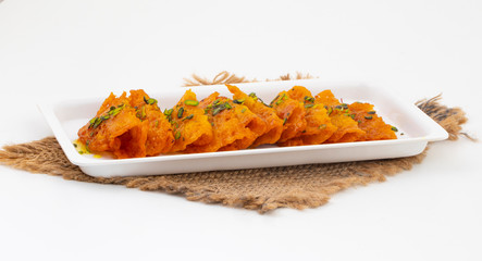 Indian Traditional Popular Sweet Food Malpua or Amalu isolated on White Background