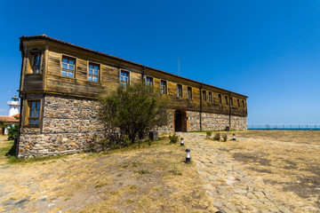 Fototapeta na wymiar Buildings (formerly owned by the Bulgarian Orthodox Church) on St. Anastasia Island in the Burgas Bay of the Black Sea. Bulgaria.