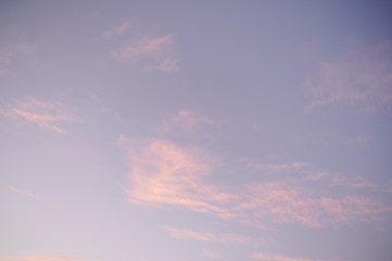 Photography of pink clouds on a blue sky.