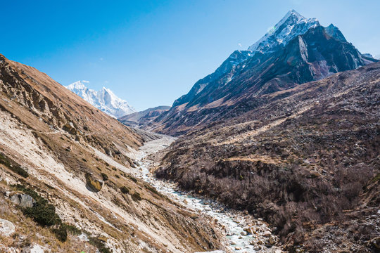 Gangotri National Sanctuary, Uttarakhand, vast valley with the river Bhagirathi flowing down to Gangotri, with Bhrigupanth Parvat and the mighty Bhagirathi Group in the backdrop