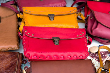 Multicolored leather women's clutches close-up.