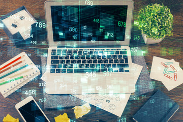 Fototapeta na wymiar Double exposure of laptop computer and technology theme hologram. Concept of freelance work.
