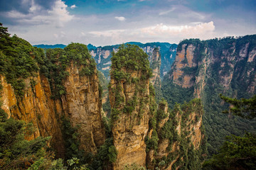  Amazing view of natural quartz sandstone pillar the Avatar Hallelujah Mountain among green woods and rocks in the Tianzi Mountains, the Zhangjiajie National Forest Park, Hunan Province, China.
