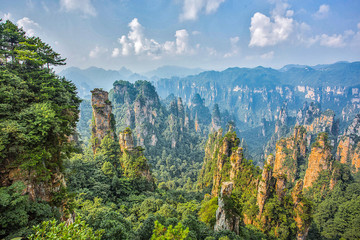  Amazing view of natural quartz sandstone pillar the Avatar Hallelujah Mountain among green woods and rocks in the Tianzi Mountains, the Zhangjiajie National Forest Park, Hunan Province, China.