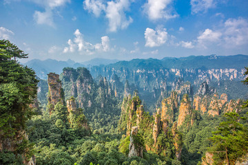  Amazing view of natural quartz sandstone pillar the Avatar Hallelujah Mountain among green woods...