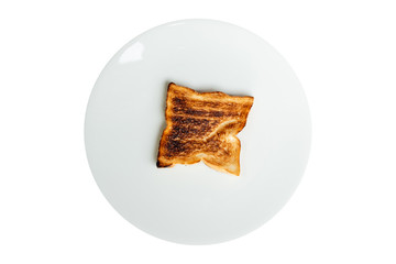 Top view burned white bread in white plate on isolated white background. 