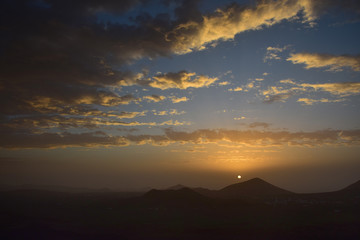 Sunrise in Lanzarote while the Calima wind is blowing.