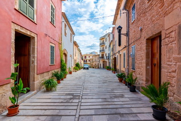 Walls and narrow streets of Alcudia old town, Mallorca, Spain