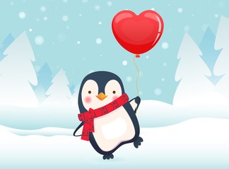 penguin holding balloon © Visual Content