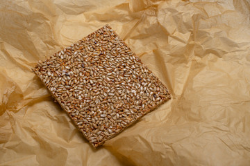  This is a dessert of honey syrup and sunflower seeds.