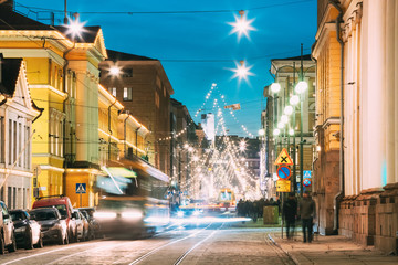 Fototapeta premium Helsinki, Finland. Night Evening Christmas Xmas New Year Festive Illumination On Aleksanterinkatu Street. Beautiful Street Decorations During Winter Holidays