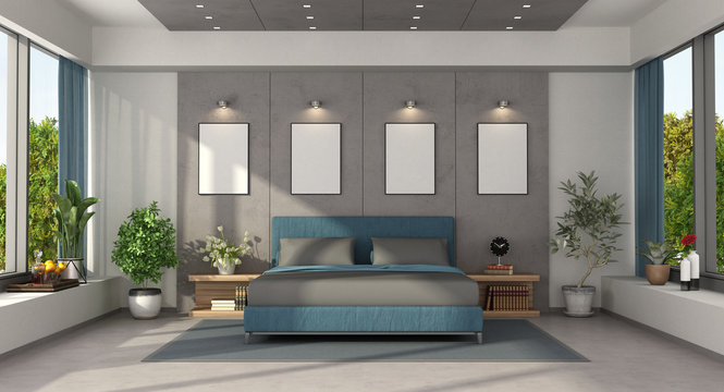 Modern master bedroom with blue double bed
