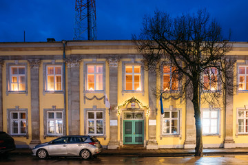 Fototapeta na wymiar Kuressaare, Estonia. Former Branch Of Tallinn Technological University In Night Time. Since 2017 It Is Part Of Estonian Maritime Academy