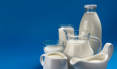 Collection of dairy products on blue wooden background