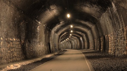 Inside a railway tunnel converted to a cycle path
