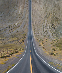 Long road across desert landscape