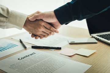 closeup.handshake business partners agree to contract Real Estate Venture International trade,contract investment in meetings vision to invest for profit.