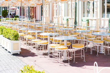 Cafe terrace with many table and chai