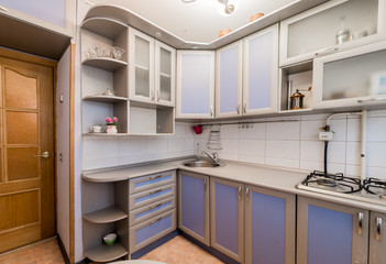 Russia, Moscow- August 25, 2019: interior room apartment modern bright cozy atmosphere. general cleaning, home decoration, preparation of house for sale. kitchen, dining area