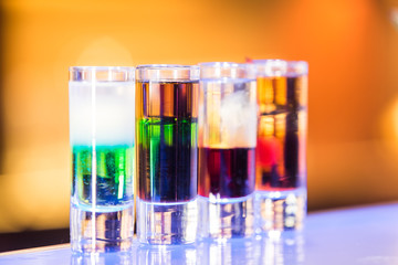 Four shots cocktail on the bar