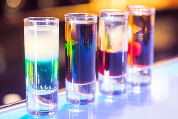 Four shots cocktail on the bar
