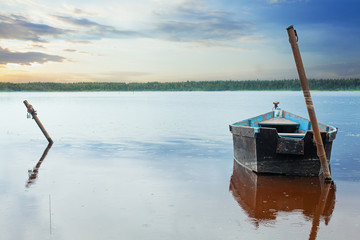Wooden Boat On The Lake. Morning nature before fishing